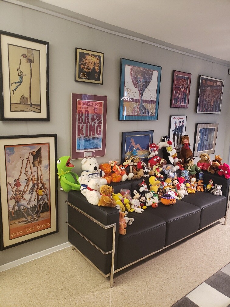 Gallery Wall Display of paintings and posters in High Rise Apartment