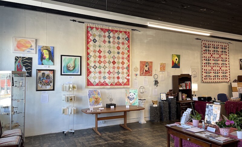 Interior view with art gallery hanging system at Mountain Valley Arts Council gallery  