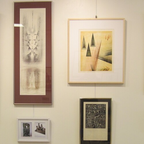 Artworks by modernist Harry Bertoia hung on art hanging system